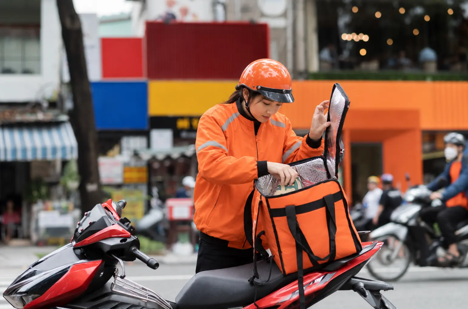 Driver checking a delivery bag before setting off
